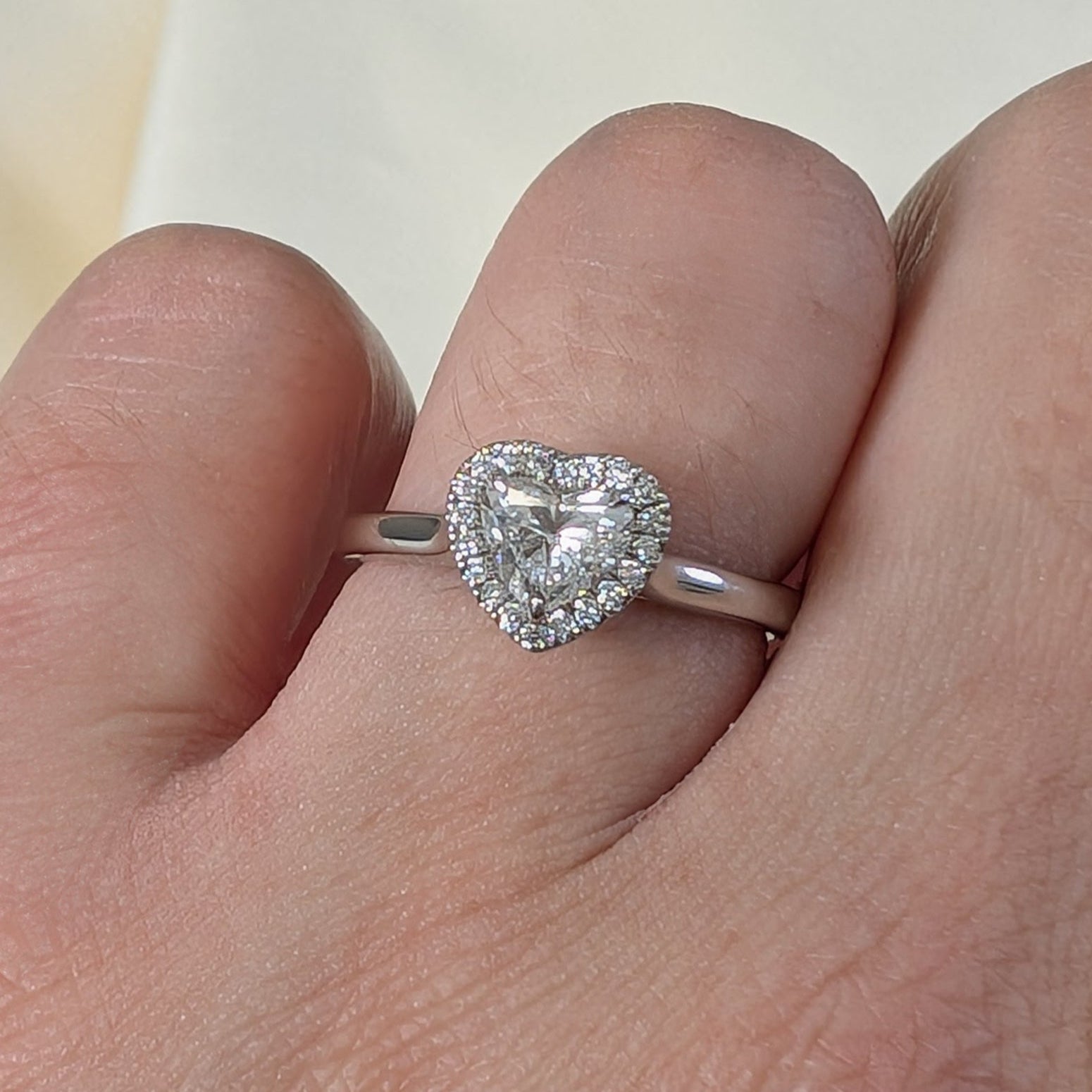 Heart-shaped diamond halo cluster ring in platinum, 0.75ct