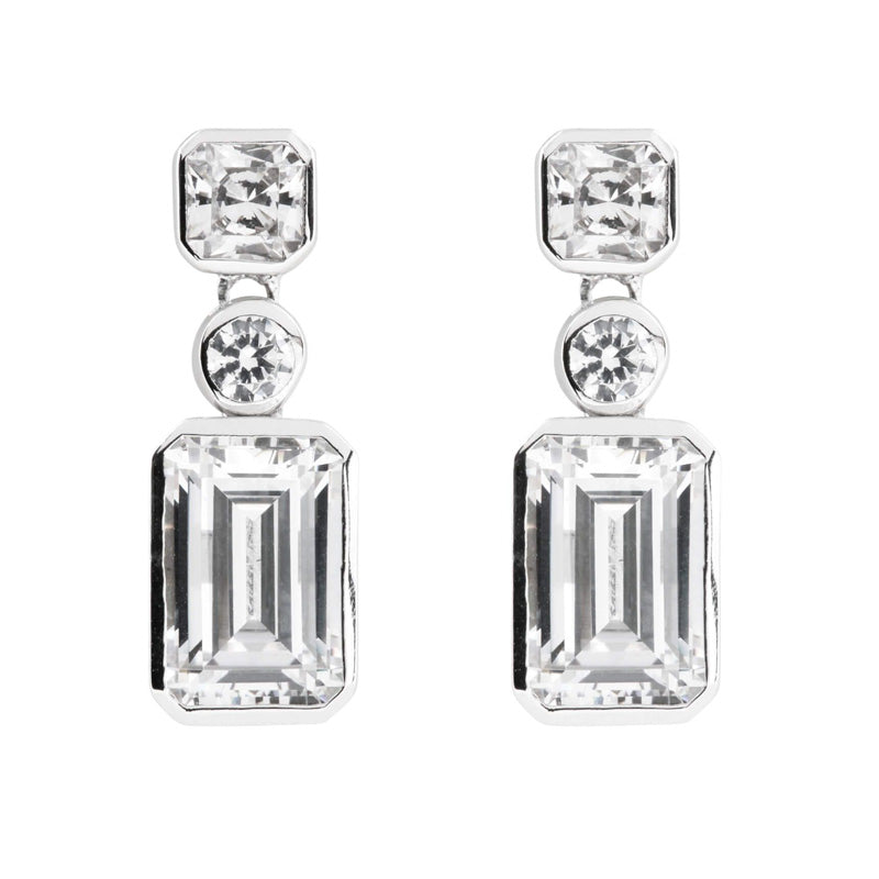 Cubic zirconia three stone drop earrings in silver.