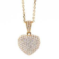 Diamond set heart pendant and chain in 18ct gold, 0.91ct