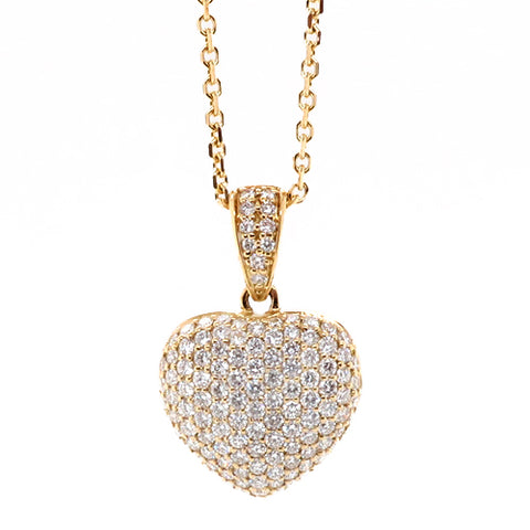 Diamond set heart pendant and chain in 18ct gold, 0.91ct