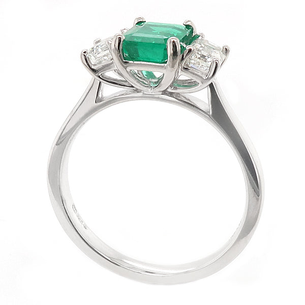 Emerald & diamond three stone ring in Platinum