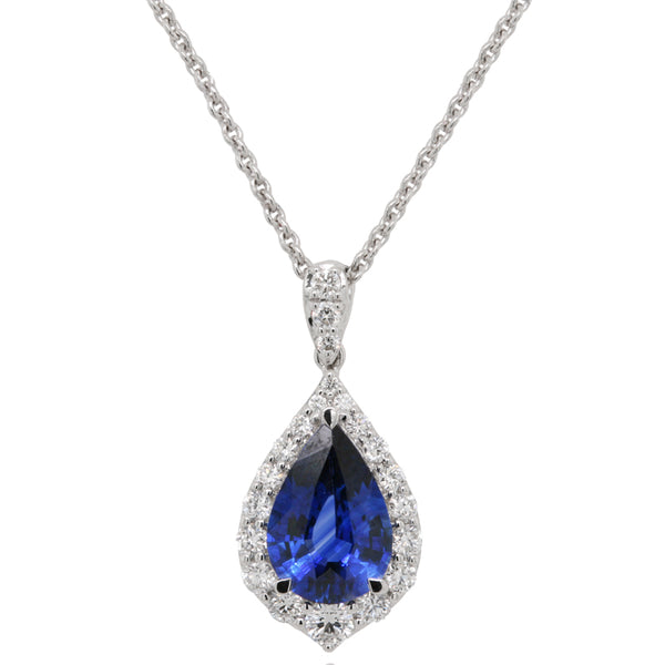Sapphire and diamond halo teardrop pendant in 18ct white gold.
