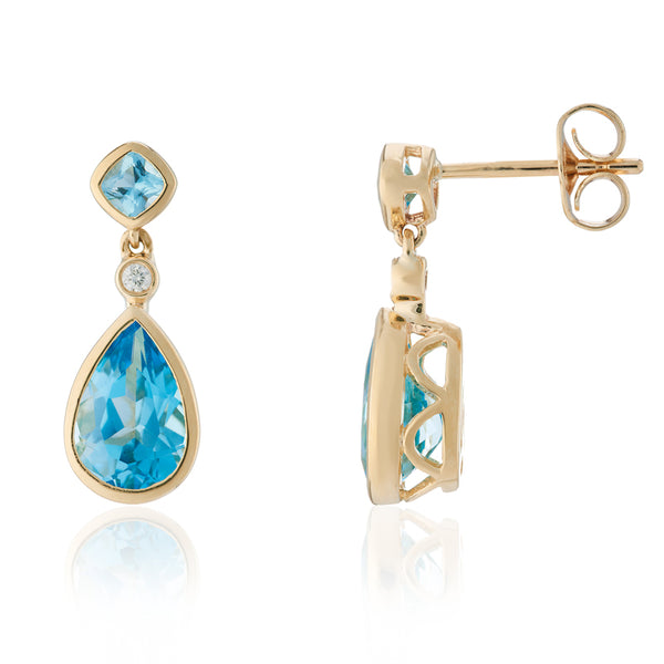 Blue topaz and diamond teardrop stud earrings in 9ct yellow gold.