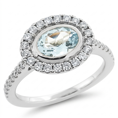 Aquamarine and Diamond Halo Cluster Ring in Platinum | 0.60ct