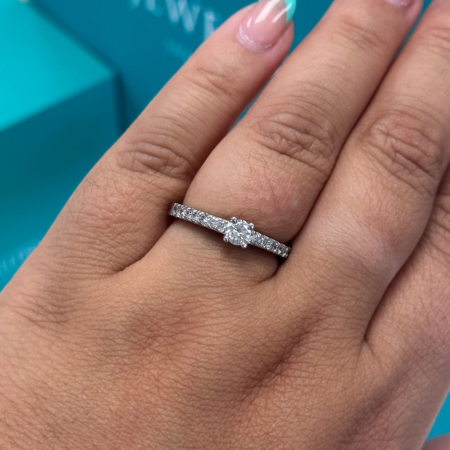 Diamond ring with diamond set shoulders in 18ct white gold, 0.50ct