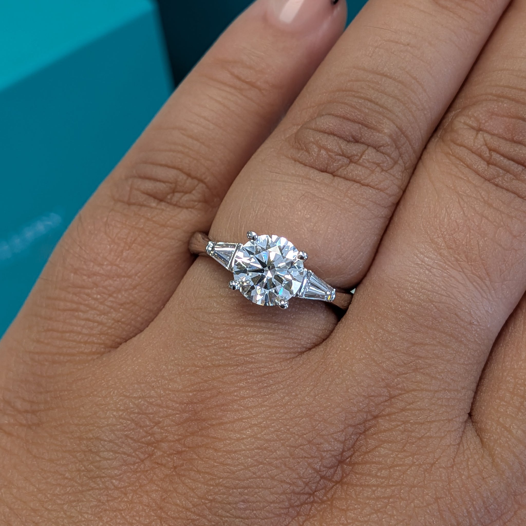 Diamond Solitaire with Tapered Baguette Shoulders in Platinum, 1.57ct