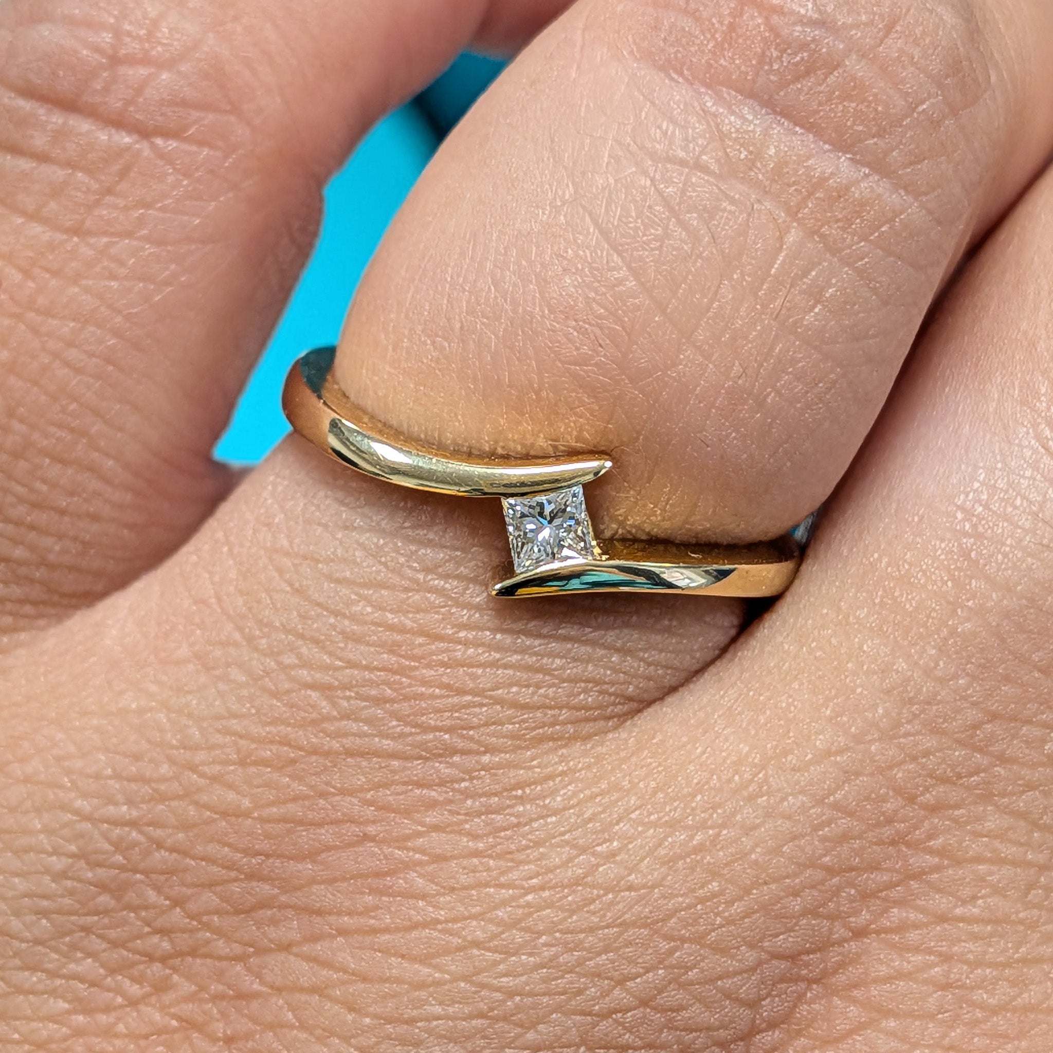 Diamond Semi-Tension Set Solitaire Engagement Ring in 18ct Yellow Gold, 0.15ct