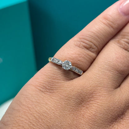 Diamond solitaire ring with shoulder detail in 18ct gold, 0.30ct