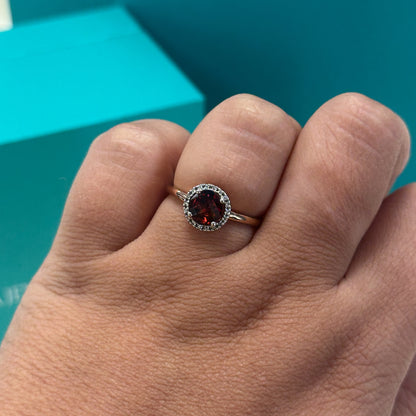 Garnet and diamond halo cluster ring in 9ct rose gold
