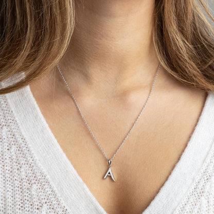 Kit Heath Signature Skript Initial Necklace in Silver.
