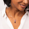 Pink and purple crystal octagon and teardrop shaped pendant and chain in silver.