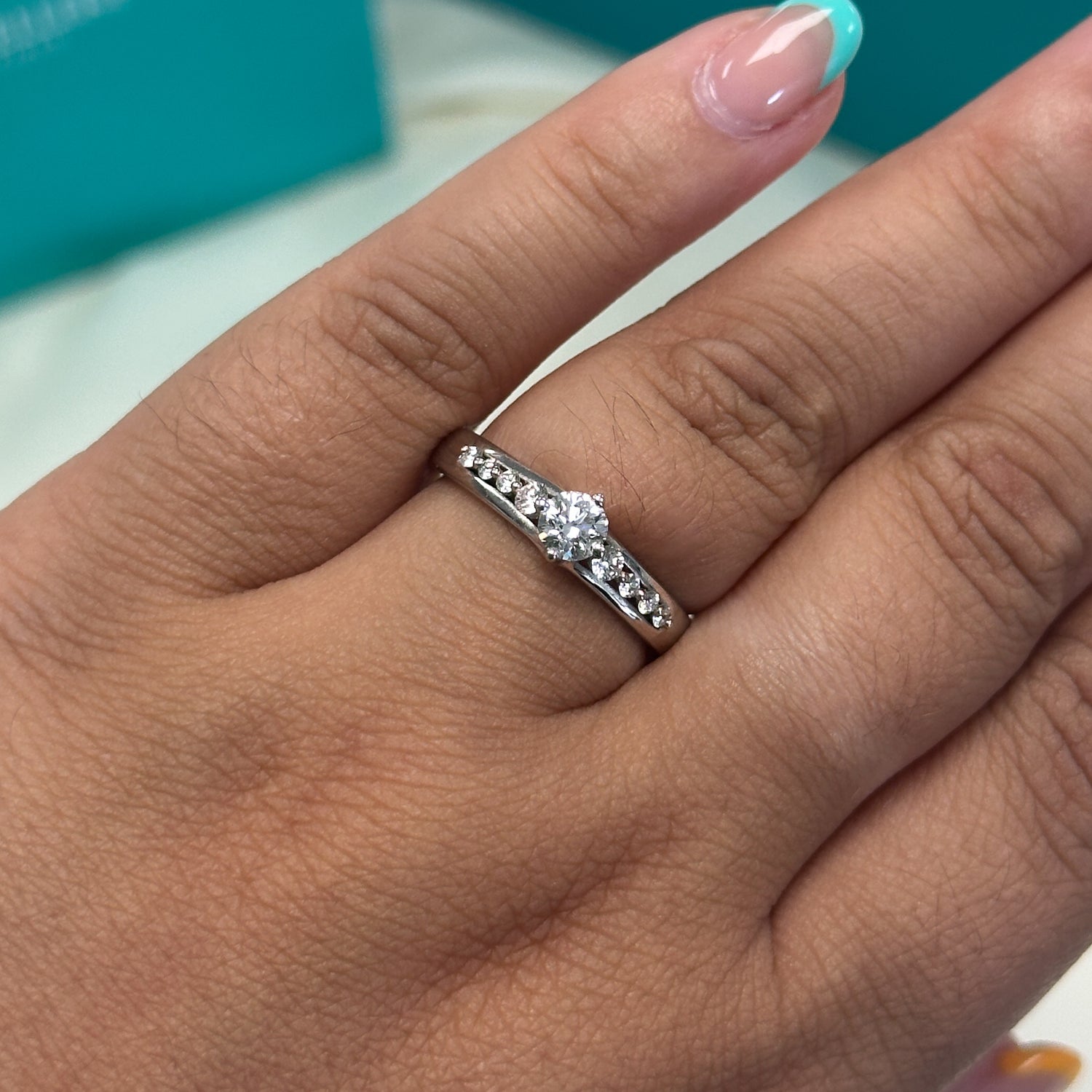 Brilliant cut diamond ring with diamond set shoulders in 18ct white gold, 0.50ct