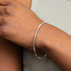 Plain push-on bangle in silver.