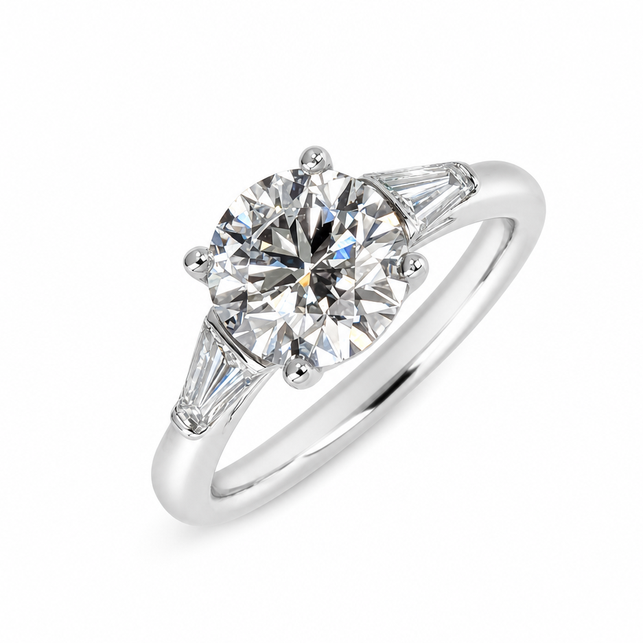 Diamond Solitaire with Tapered Baguette Shoulders in Platinum, 1.57ct
