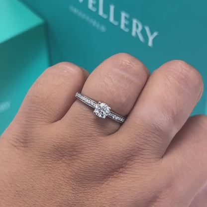 Diamond ring with diamond set shoulders in 18ct white gold, 0.61ct