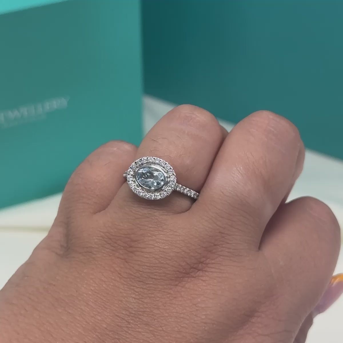 Aquamarine and Diamond Halo Cluster Ring in Platinum | 0.60ct