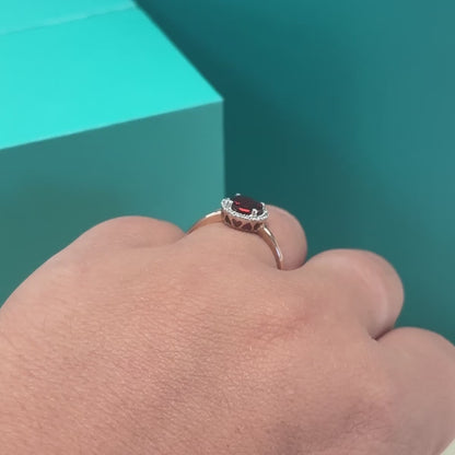 Garnet and diamond halo cluster ring in 9ct rose gold