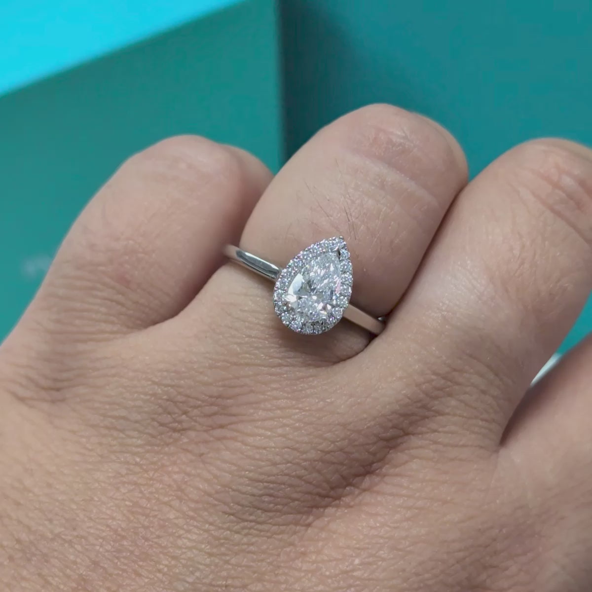 Pear Shaped Diamond Halo Engagement Ring in Platinum, 0.85ct