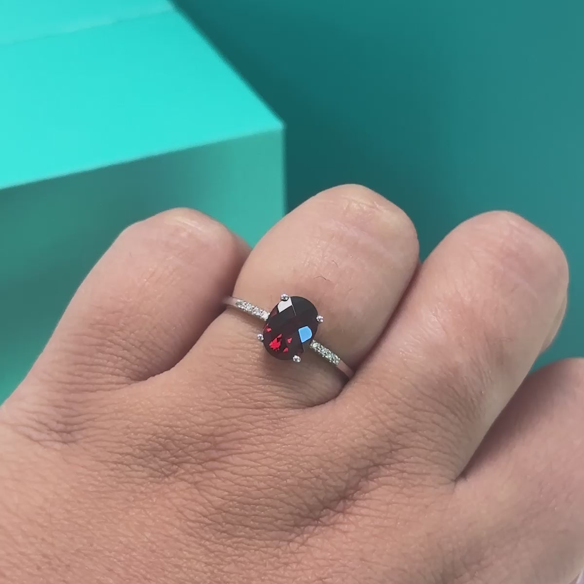 Garnet and diamond ring in 9ct white gold