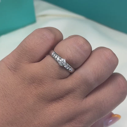 Brilliant cut diamond ring with diamond set shoulders in 18ct white gold, 0.50ct