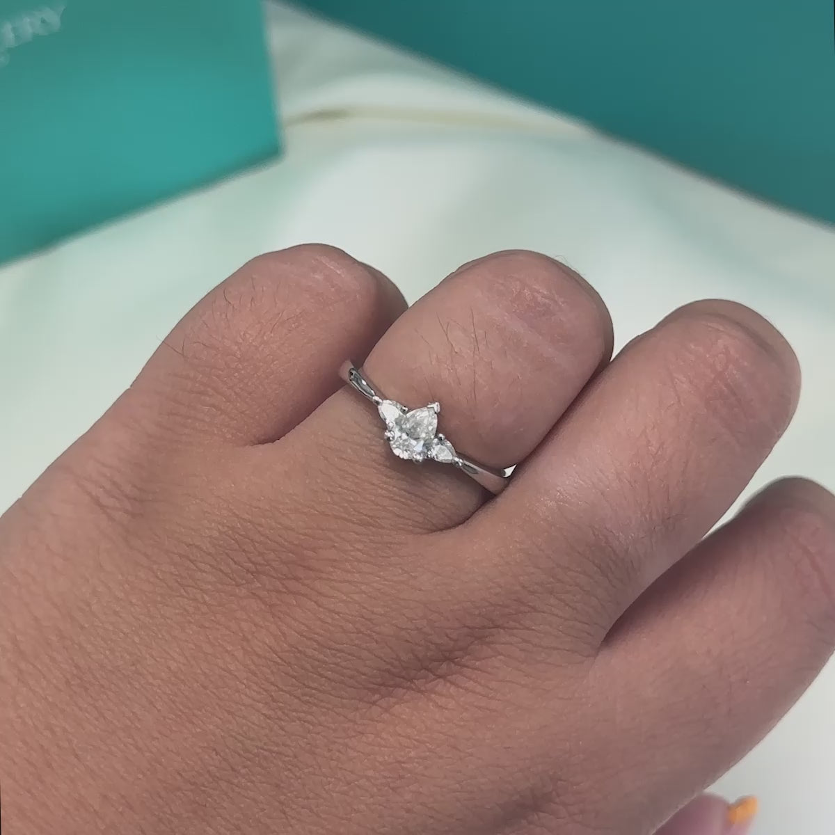 Pear shape diamond three stone ring in 18ct white gold,  0.58ct