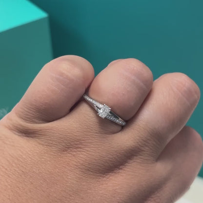 Phoenix cut diamond solitaire with diamond set shoulders in 18ct white gold, 0.33ct