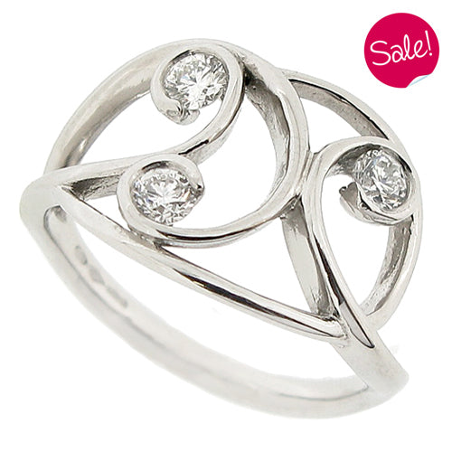Diamond swirl three stone dress ring in platinum, 0.31ct