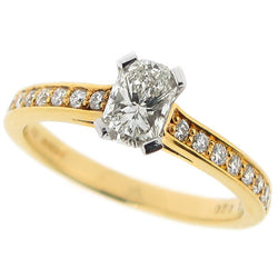 Phoenix cut diamond ring with diamond set shoulders in 18ct yellow gold, 0.72ct