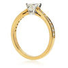 Phoenix cut diamond ring with diamond set shoulders in 18ct yellow gold, 0.72ct