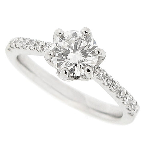Diamond solitaire ring with diamond set shoulders in platinum, 1.24ct