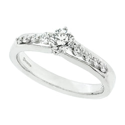 Brilliant cut diamond ring with diamond set shoulders in 18ct white gold, 0.50ct