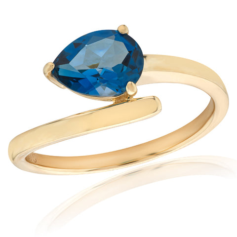 London Blue Topaz crossover solitaire ring in 9ct gold