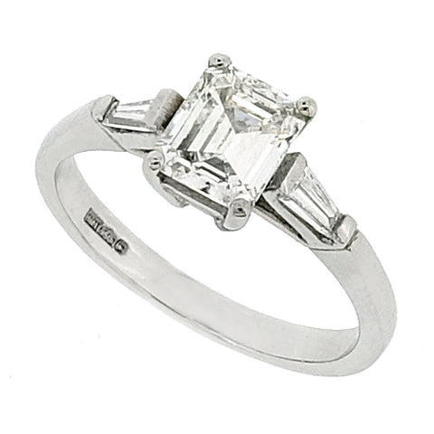 Emerald cut diamond three stone ring in platinum, 1.20ct