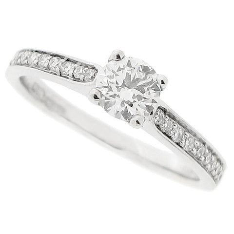 Diamond solitaire ring with diamond set shoulders in 18ct white gold, 0.61ct