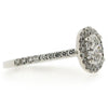 Oval diamond halo cluster ring in platinum, 1.10ct