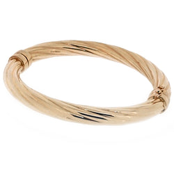 Twisted hinged bangle in 9ct gold