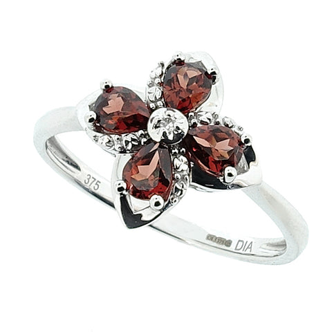 Garnet and diamond floral dress ring in 9ct white gold