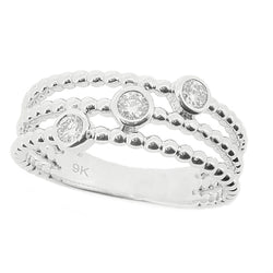 Diamond three stone dress ring in 9ct white gold, 0.15ct