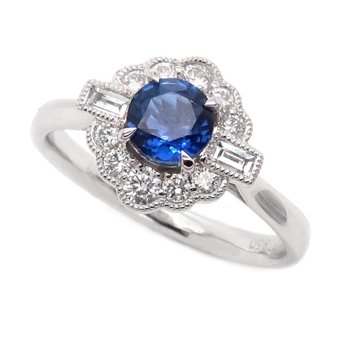 Sapphire and diamond cluster ring in platinum.