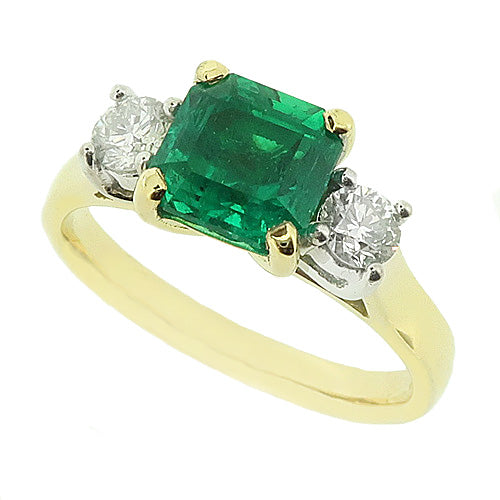 Emerald and diamond three stone ring in 18ct gold