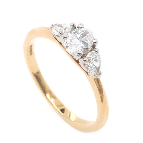 Oval and pear shape diamond three stone ring in 18ct gold and platinum, 0.62ct