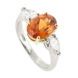 Mandarin garnet and diamond three stone ring in platinum and 18ct gold