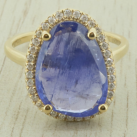 Tanzanite and diamond halo cluster ring in 18ct gold