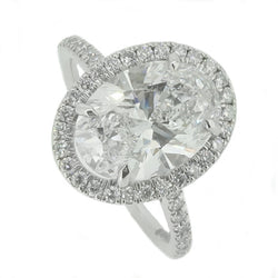 Lab grown oval diamond halo cluster ring in platinum, 3.41ct