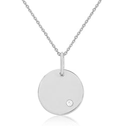 Diamond set disc pendant and chain in 9ct white gold