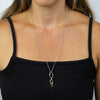 Looped drop pendant and chain in silver with gold plating