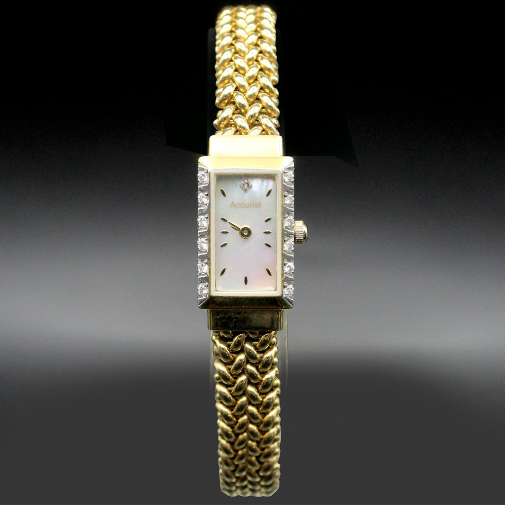 Accurist ladies' diamond set dress watch in 9ct gold